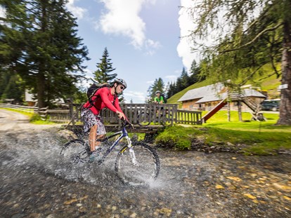 Mountainbike Urlaub - Fahrradwaschplatz - Biken in der Region Bad Kleinkirchheim - Hotel GUT Trattlerhof & Chalets****