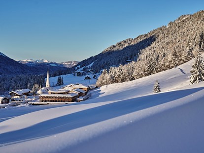 Mountainbike Urlaub - Bayern - Heimat des HUBERTUS Mountain Refugio in winterlicher Landschaft - HUBERTUS Mountain Refugio Allgäu