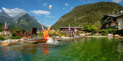 Mountainbike Urlaub - Kirchberg in Tirol - Naturschwimmteich - Familien und Vitalhotel Mühlpointhof ***S