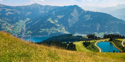 Mountainbike Urlaub - Kirchberg in Tirol - Bergsee auf der Schmittenhöhe mit Blick auf den Zeller See - Hotel Sonnblick