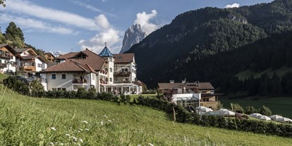 Mountainbike Urlaub - Trentino-Südtirol - Eingebettet in die wundervolle Dolomitenlandschaft, ist unser Hotel für Ruhe-Suchende der ideale Rückzugsort. - Alpenheim  Charming Hotel & Spa Hotel