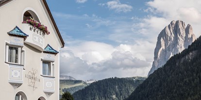 Mountainbike Urlaub - Verpflegung: Halbpension - Trentino-Südtirol - Ein herrlicher Ausblick auf die Dolomiten. - Alpenheim  Charming Hotel & Spa Hotel