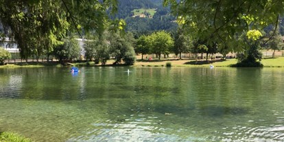 Mountainbike Urlaub - Bikeverleih beim Hotel: Zubehör - Trentino-Südtirol - kostenloser Naturbadesee
(300 m vom Hotel entfernt) - Hotel Innerhofer 