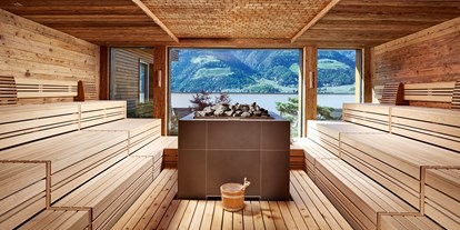 Mountainbike Urlaub - Umgebungsschwerpunkt: Berg - Trentino-Südtirol - Altholzsauna mit Ausblick 90 °C - Feldhof DolceVita Resort