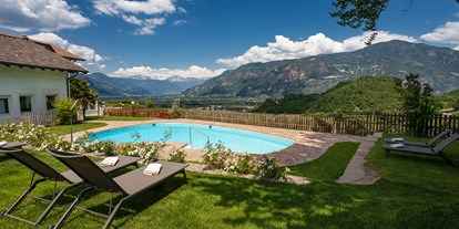 Mountainbike Urlaub - Bikeverleih beim Hotel: E-Mountainbikes - Trentino-Südtirol - Pool mit Panoramablick - Hotel Sigmundskron