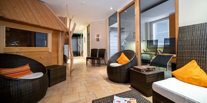 Mountainbike Urlaub - Niedersachsen - Traumraum Lounge mit finnischer Sauna Kota und Erlebnisdusche  - ANDERS Hotel Walsrode