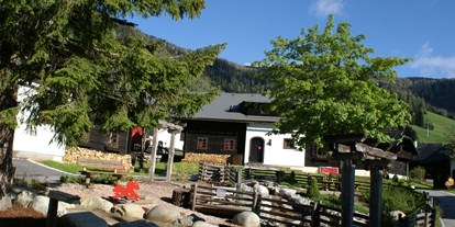 Mountainbike Urlaub - Döbriach - Dorfplatz Dorf Kleinwild - Slow Travel Resort Kirchleitn