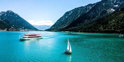 Mountainbike Urlaub - Parkplatz: kostenlos beim Hotel - Mils - Alpenhotel Tyrol - 4* Adults Only Hotel am Achensee