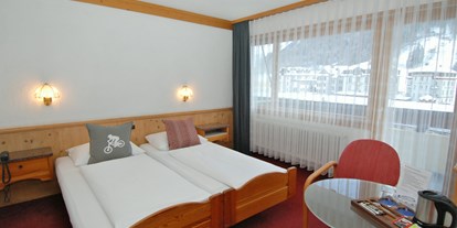 Mountainbike Urlaub - Obwalden - Doppelzimmer auch ohne Teppich möglich - Hotel Crystal Engelberg
