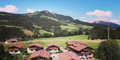 Mountainbike Urlaub - Hotel-Schwerpunkt: Mountainbike & Familie - St. Johann in Tirol - Feriendorf Wallenburg