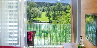 Mountainbike Urlaub - Umgebungsschwerpunkt: See - Salzburg - Balkon des Doppelzimmers Seeblick mit traumhafter Aussicht - Ritzenhof 4*s Hotel und Spa am See