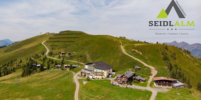 Mountainbike Urlaub - Bikeverleih beim Hotel: E-Mountainbikes - St. Johann in Tirol - Außenansicht - mountainlovers Berghotel*** SeidlAlm
