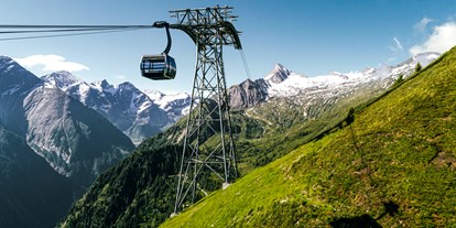 Mountainbike Urlaub - Biketransport: Bergbahnen - Gondelbahn zum Kitzsteinhorn Gletscher - Hotel Sonnblick