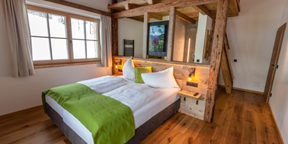 Mountainbike Urlaub - Umgebungsschwerpunkt: Fluss - Salzburg - Zimmer mit offenen Badezimmer und Juchee im Chalet Sepp - Chalets Marolden