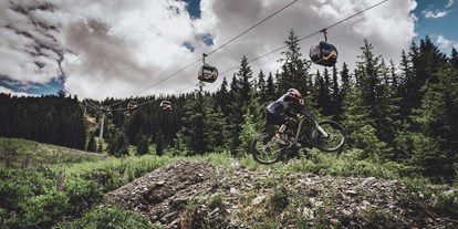 Mountainbike Urlaub - Parkplatz: gebührenpflichtig in Gehweite - Steiermark - Downhillstrecke Planai - B&B Hotel | Appartements | Bar dieBARBARA 