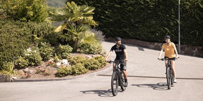 Mountainbike Urlaub - Parkplatz: kostenlos beim Hotel - Fai della Paganella - Biker im Hotel Torgglhof in Kaltern - Hotel Torgglhof