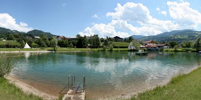 Mountainbike Urlaub - Schwimmen - Steiermark - Naturbadesee direkt beim Hotel - Sport- & Familienhotel Bärenwirt