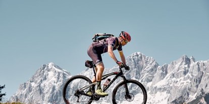 Mountainbike Urlaub - Hotel-Schwerpunkt: Mountainbike & Wellness - Schladming - Hausherr und Bike Guide Thomas zeigt dir die schönsten Bike-Touren in der Reigon  - Stadthotel Brunner