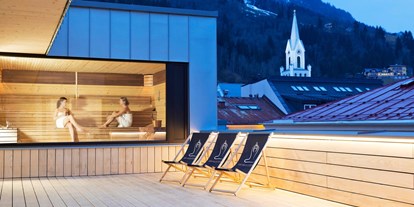 Mountainbike Urlaub - Sauna - Schladming - Sauna mit Ausblick auf das wunderbare Dachstein-Massiv.  - Stadthotel Brunner