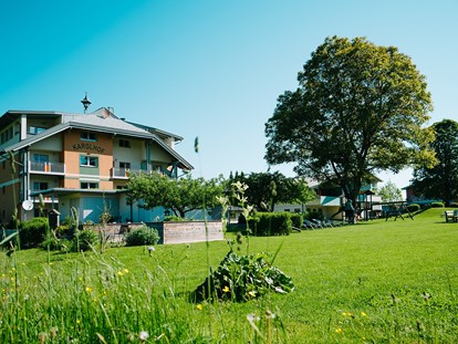 Mountainbike Urlaub - Garten - Kärnten - Unser komplett neues Karglhof Stammhaus - Ferienwohnungen und Seebungalows am Faaker See - Karglhof OG