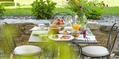 Mountainbike Urlaub - Garten - Tirol - Für zusätzlichen Genuss am Morgen sorgt unser leckeres Frühstück vom Buffet, das wir in unserer Stub'n für Dich herrichten. - ASTER