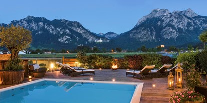 Mountainbike Urlaub - Wellnessbereich - Grän - Pool mit Schlossblick - Hotel Das Rübezahl
