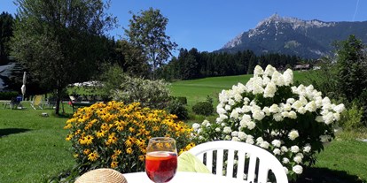 Mountainbike Urlaub - Garten - Flachau - Auszeit im idyllischen Hotelgarten  - Landhotel Häuserl im Wald 