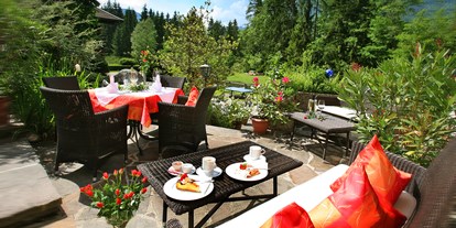 Mountainbike Urlaub - Hunde: erlaubt - Pinzgau - Ihr Platz im romantischen Gastgarten - Naturhotel Schütterbad